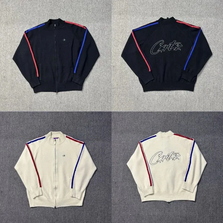 Black and cream zip-up knit jackets with red and blue sleeve stripes